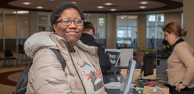 Student standing in Student Success Center